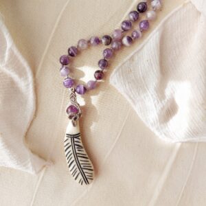 amethyst beaded necklace with macrame pendant and feather charm