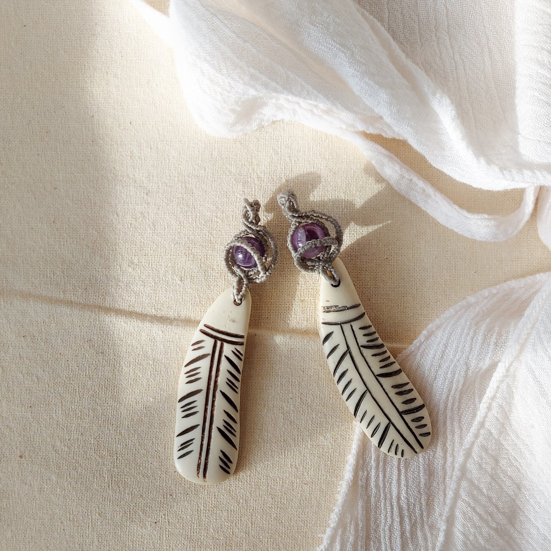 amethyst gemstone macrame pendant with feather charm