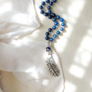 lapis lazuli beaded necklace with macrame pendant and feather charm